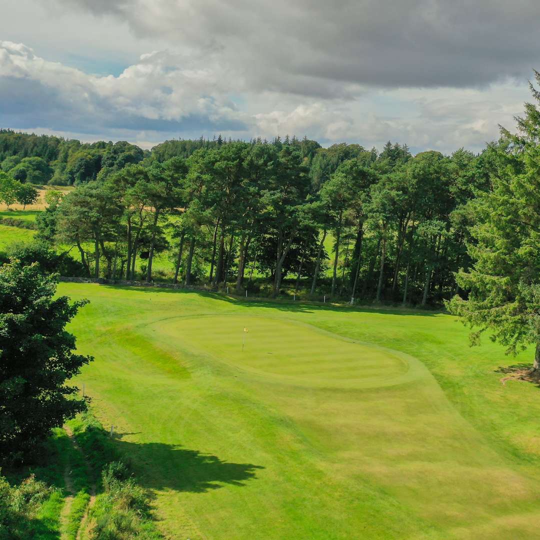Aerial view of a green and surrounding bunkers on the Blairs 9-hole course, Aberdeen