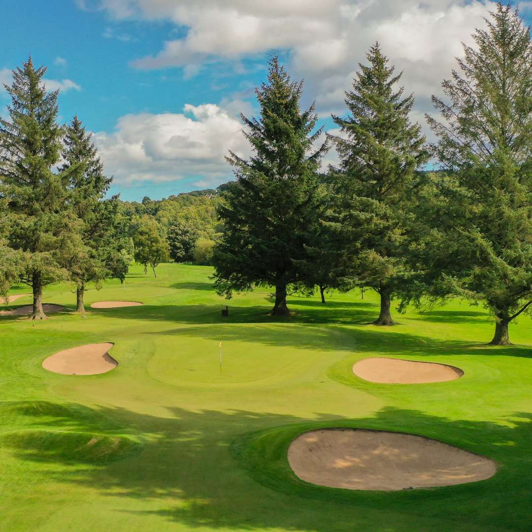 Greens and bunkers on the Blairs 9-hole golf course at Deeside Golf Club, Aberdeen