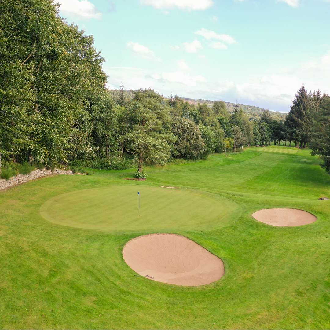 Tree-lined fairway and bunkers on the Haughton Course at Deeside Golf Club