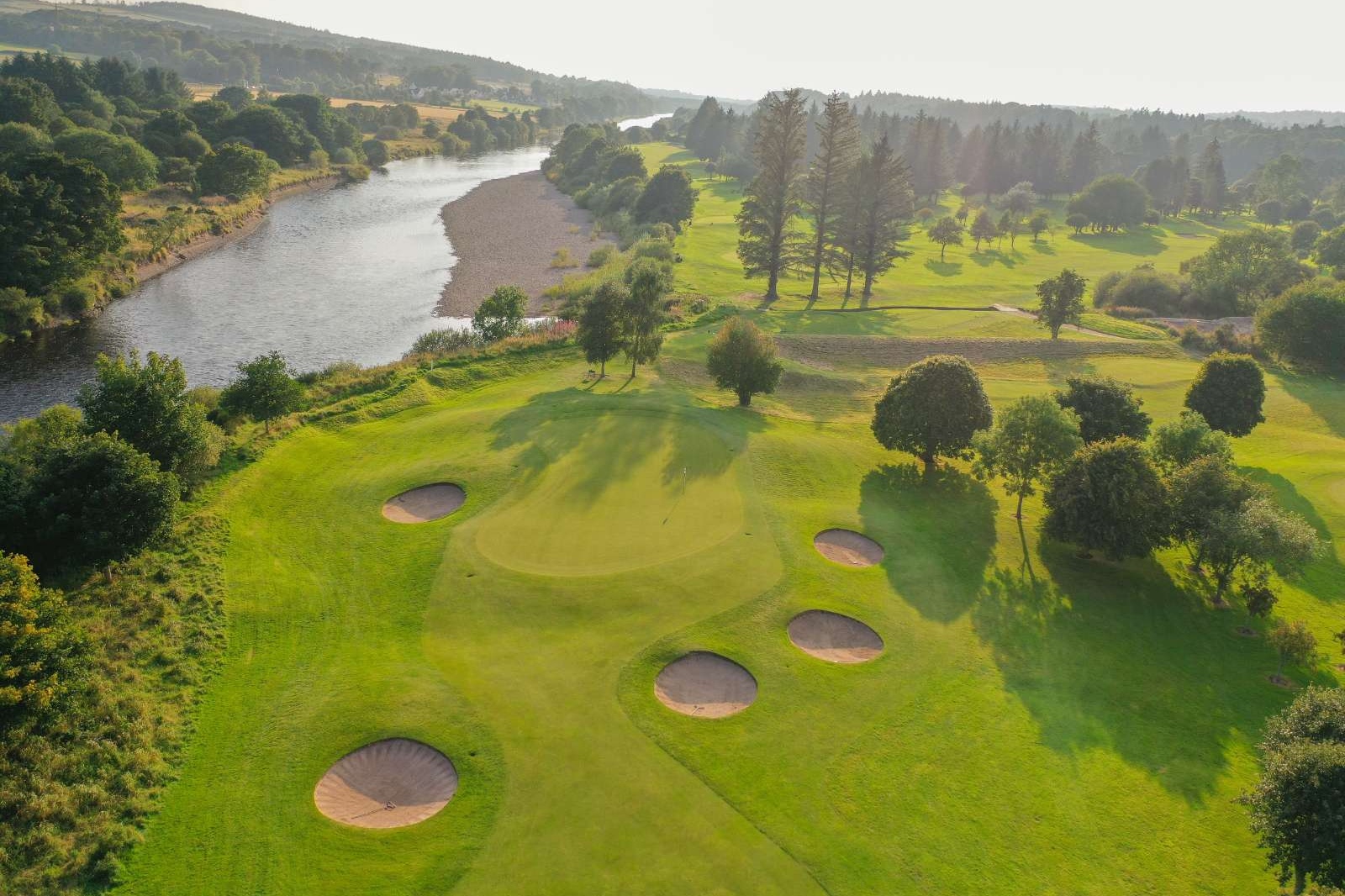 Aerial view of golf green and fairway beside the River Dee on the Haughton Course at Deeside Golf Club