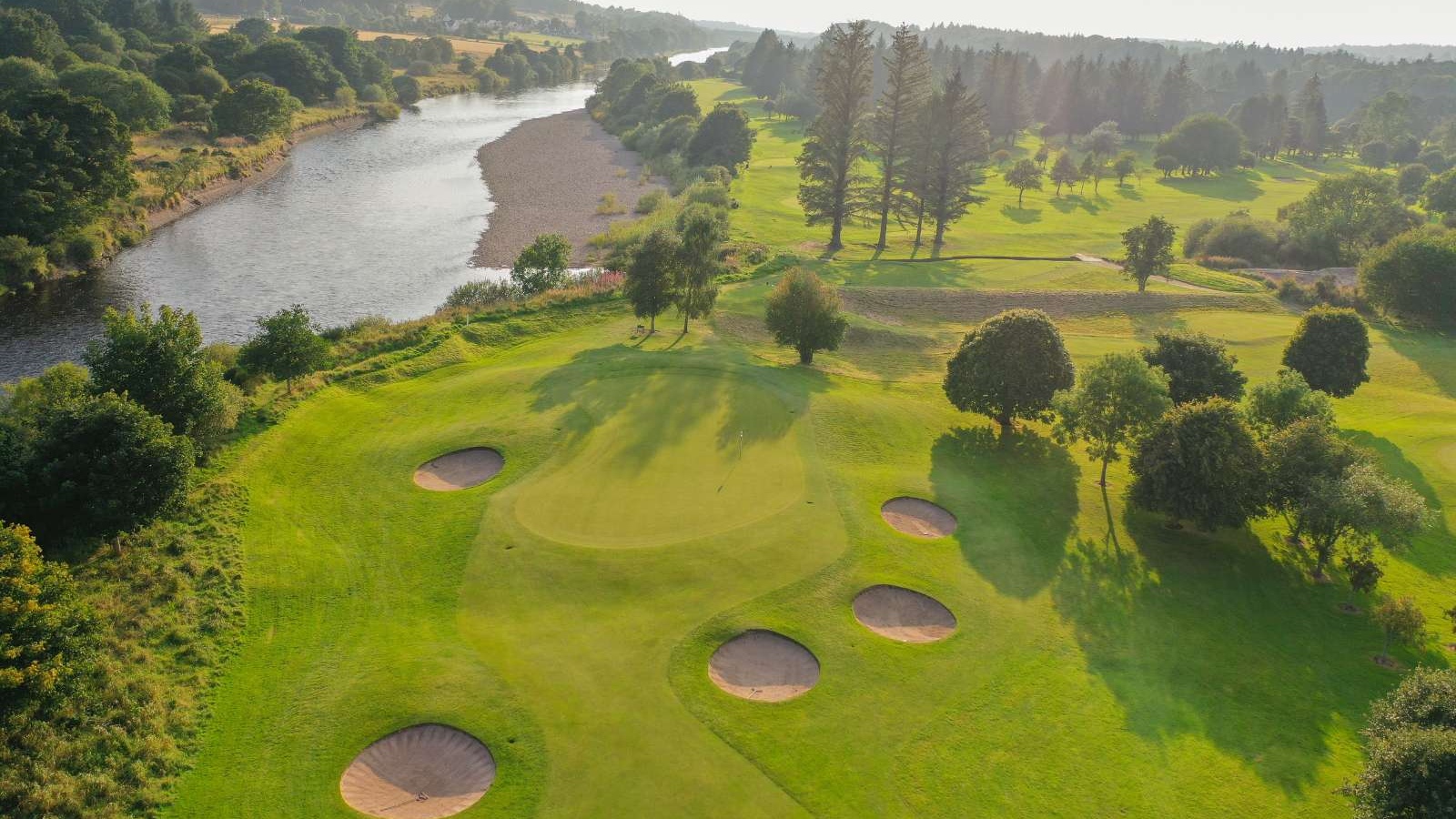 Aerial view of golf green and fairway beside the River Dee on the Haughton Course at Deeside Golf Club