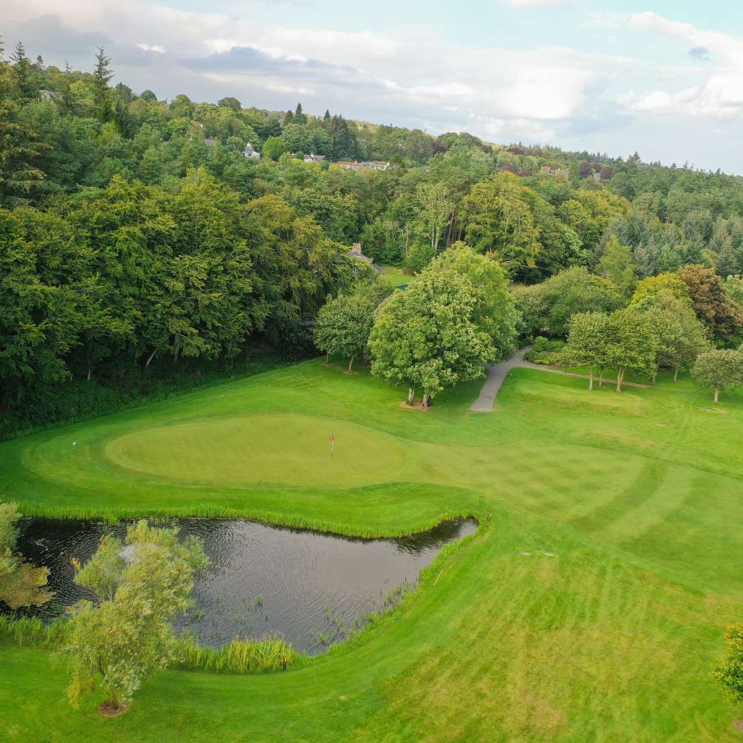 Golf green and fairway beside the River Dee on the Haughton Course at Deeside Golf Club