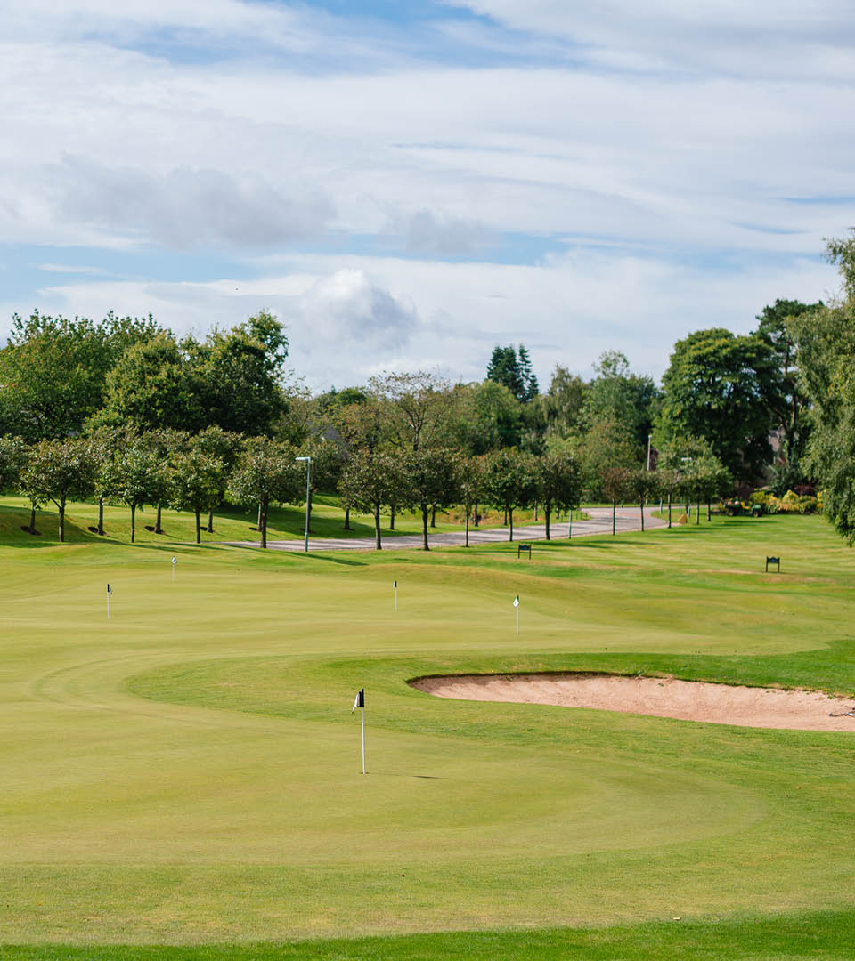 Putting practice green with bunker at Deeside Golf Club