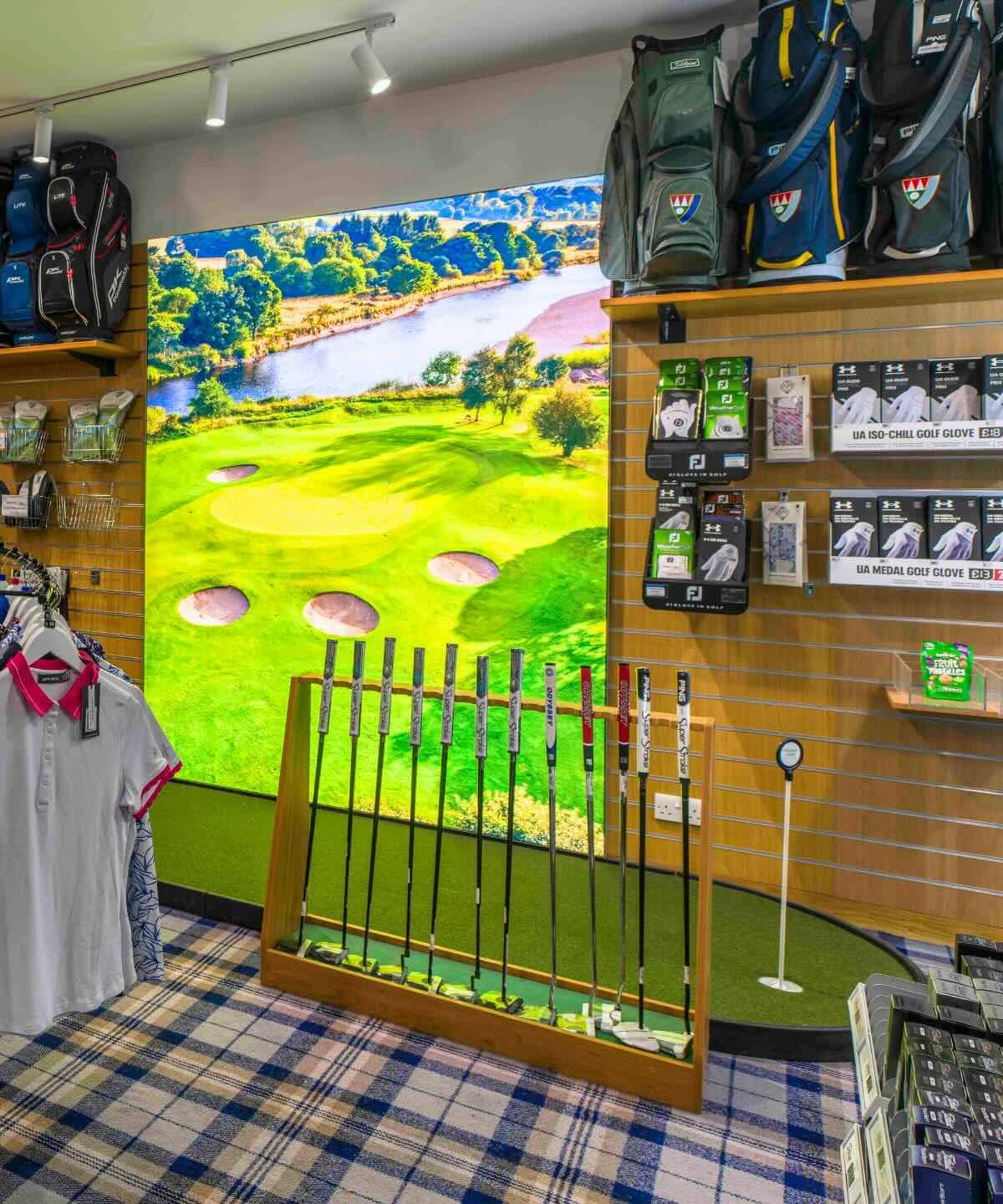 Golf bags, putters and gloves displayed at the Deeside Golf Club Pro Shop